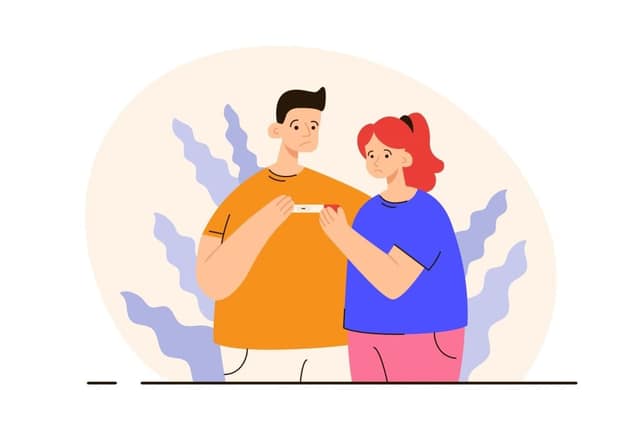 Triste pareja joven con prueba de embarazo negativa